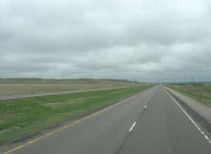 Empty road and a cloudy sky