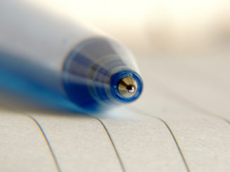 Blue pen on paper