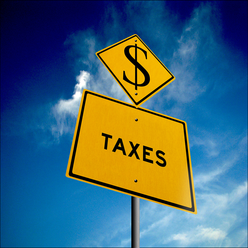 Road sign reading "Taxes"