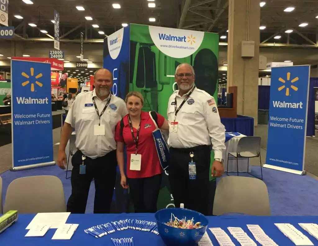 Class A Drivers' Jackie with Walmart representatives at The Great American Trucking Show