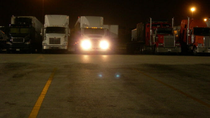 Trucks at a truck stop at night