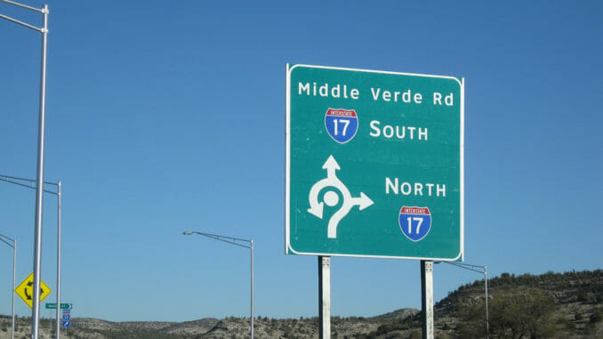 Arizona highway sign with roundabout