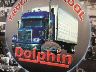 Dolphin Trucking School Logo inside of office