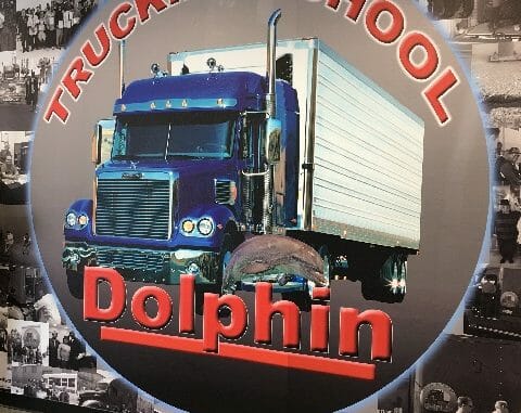 Dolphin Trucking School Logo inside of office