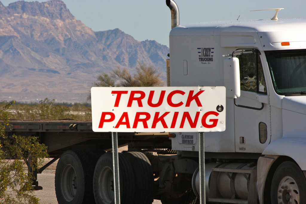 Sign for truck parking with mountain in the background