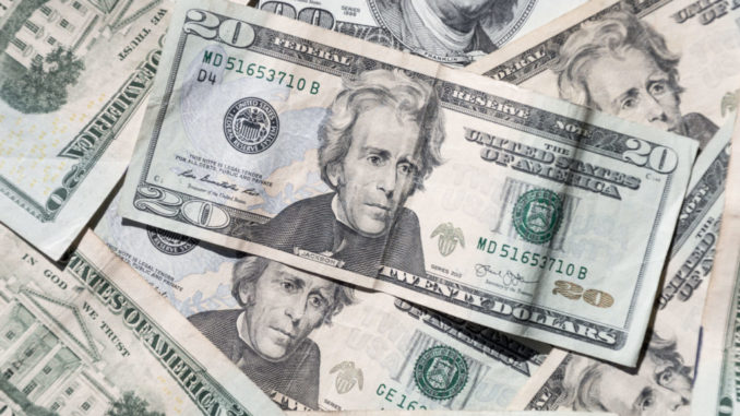 pile of twenty dollar bills